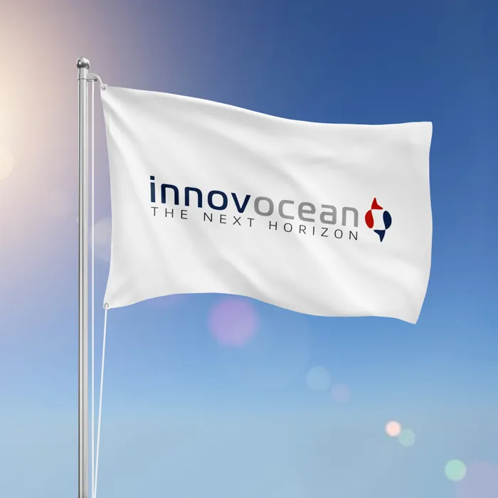 The Innovocean flag, carrying the tagline The Next Horizon, flying against a clear sky.